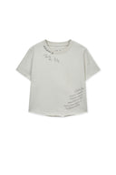 Matin Kim GRAFFITI ROUND HEM CROP TOP IN CREAM