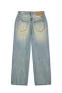 Matin Kim   |    VINTAGE DIRTY WASHED DENIM PANTS IN LIGHT BLUE