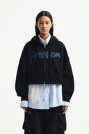 Matin Kim   |    GRAFFITI LOGO CROP HOODY ZIP UP IN BLACK