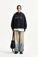 Matin Kim   |    VINTAGE DIRTY WASHED DENIM PANTS IN LIGHT BLUE